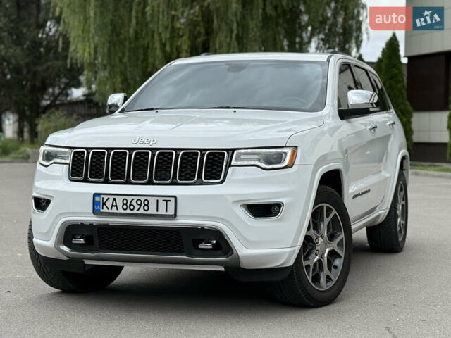 Білий Джип Grand Cherokee, об'ємом двигуна 5.7 л та пробігом 93 тис. км за 34900 $, фото 1 на Automoto.ua