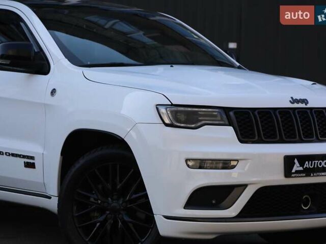 Белый Джип Гранд Чероки, объемом двигателя 5.65 л и пробегом 80 тыс. км за 35900 $, фото 3 на Automoto.ua