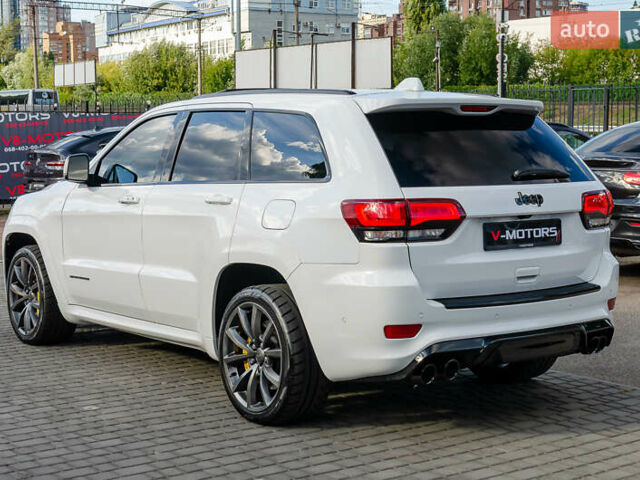 Білий Джип Grand Cherokee, об'ємом двигуна 6.2 л та пробігом 148 тис. км за 57700 $, фото 8 на Automoto.ua