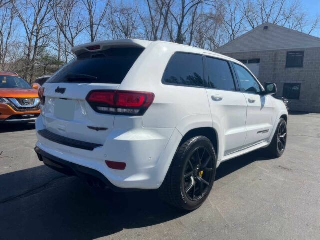 Белый Джип Гранд Чероки, объемом двигателя 6.2 л и пробегом 39 тыс. км за 12400 $, фото 7 на Automoto.ua