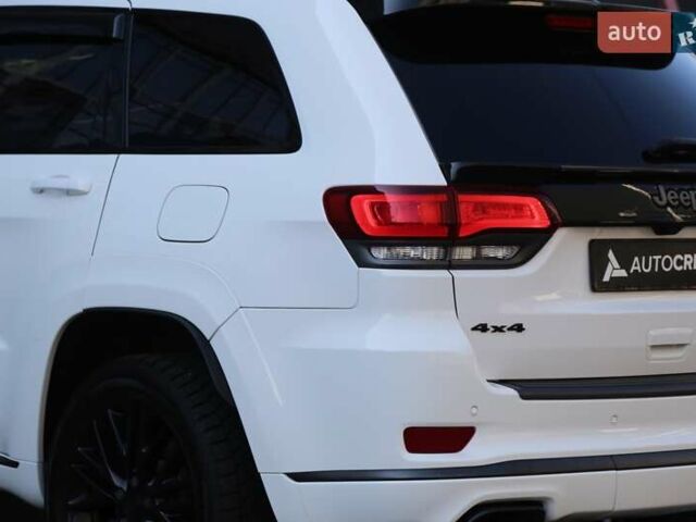 Белый Джип Гранд Чероки, объемом двигателя 5.65 л и пробегом 80 тыс. км за 35900 $, фото 7 на Automoto.ua