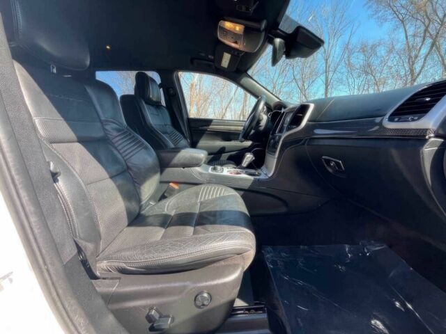 Белый Джип Гранд Чероки, объемом двигателя 6.2 л и пробегом 39 тыс. км за 12400 $, фото 8 на Automoto.ua