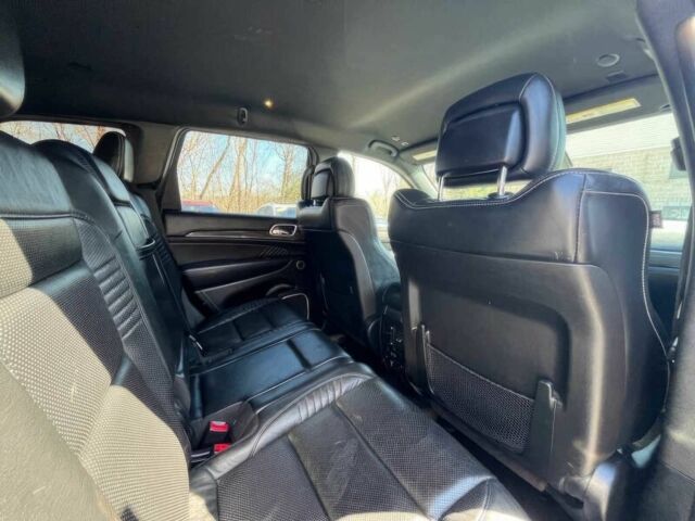 Белый Джип Гранд Чероки, объемом двигателя 6.2 л и пробегом 39 тыс. км за 12400 $, фото 12 на Automoto.ua