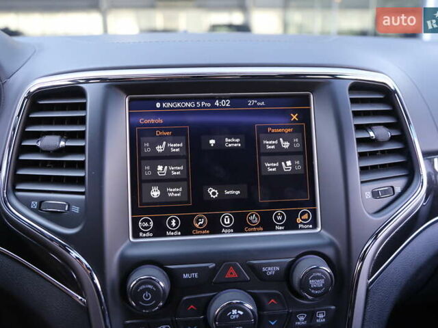 Белый Джип Гранд Чероки, объемом двигателя 5.65 л и пробегом 80 тыс. км за 35900 $, фото 19 на Automoto.ua