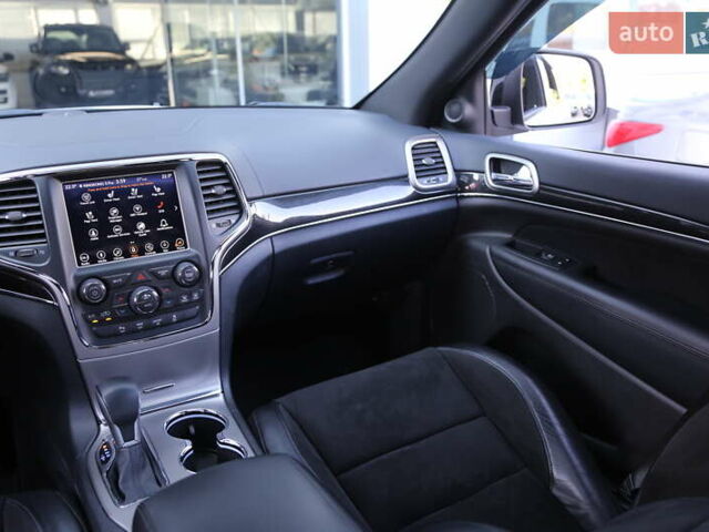 Белый Джип Гранд Чероки, объемом двигателя 5.65 л и пробегом 80 тыс. км за 35900 $, фото 14 на Automoto.ua