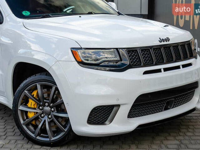 Білий Джип Grand Cherokee, об'ємом двигуна 6.2 л та пробігом 148 тис. км за 57700 $, фото 10 на Automoto.ua