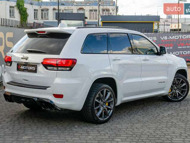 Білий Джип Grand Cherokee, об'ємом двигуна 6.2 л та пробігом 148 тис. км за 57700 $, фото 5 на Automoto.ua