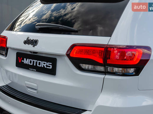 Білий Джип Grand Cherokee, об'ємом двигуна 6.2 л та пробігом 148 тис. км за 57700 $, фото 14 на Automoto.ua