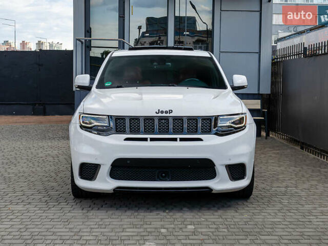 Білий Джип Grand Cherokee, об'ємом двигуна 6.2 л та пробігом 148 тис. км за 57700 $, фото 4 на Automoto.ua