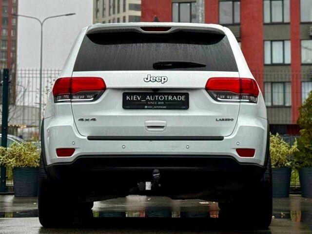 Белый Джип Гранд Чероки, объемом двигателя 3.6 л и пробегом 142 тыс. км за 22500 $, фото 1 на Automoto.ua