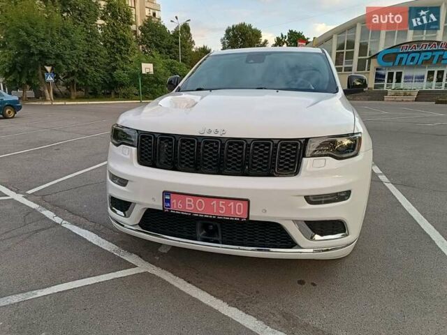 Білий Джип Grand Cherokee, об'ємом двигуна 5.7 л та пробігом 140 тис. км за 29900 $, фото 2 на Automoto.ua