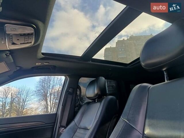 Белый Джип Гранд Чероки, объемом двигателя 5.65 л и пробегом 154 тыс. км за 28900 $, фото 19 на Automoto.ua