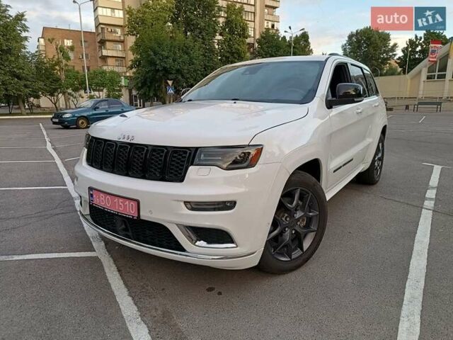 Білий Джип Grand Cherokee, об'ємом двигуна 5.7 л та пробігом 140 тис. км за 29900 $, фото 1 на Automoto.ua