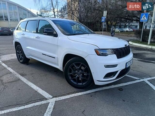 Белый Джип Гранд Чероки, объемом двигателя 5.65 л и пробегом 154 тыс. км за 28900 $, фото 11 на Automoto.ua