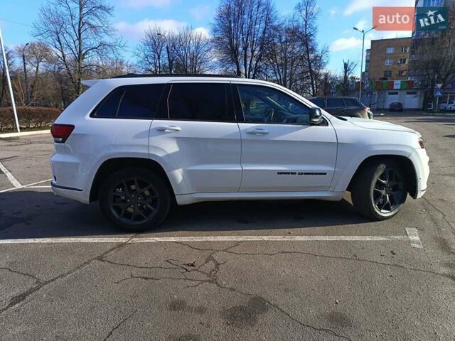 Белый Джип Гранд Чероки, объемом двигателя 5.65 л и пробегом 154 тыс. км за 28900 $, фото 6 на Automoto.ua