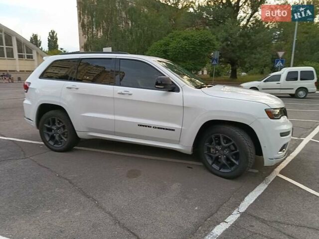 Білий Джип Grand Cherokee, об'ємом двигуна 5.7 л та пробігом 140 тис. км за 29900 $, фото 3 на Automoto.ua