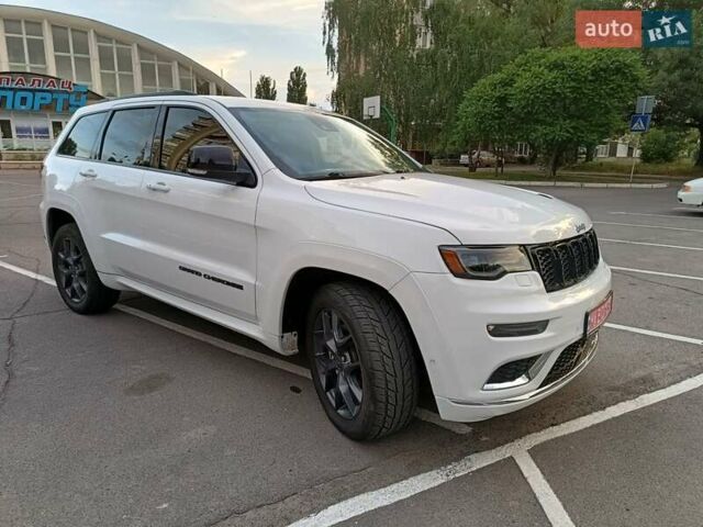 Білий Джип Grand Cherokee, об'ємом двигуна 5.7 л та пробігом 140 тис. км за 29900 $, фото 4 на Automoto.ua