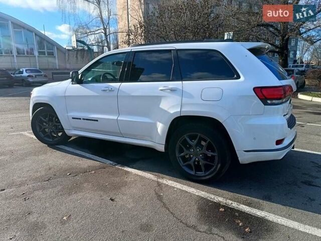 Белый Джип Гранд Чероки, объемом двигателя 5.65 л и пробегом 154 тыс. км за 28900 $, фото 4 на Automoto.ua