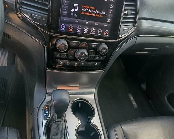 Белый Джип Гранд Чероки, объемом двигателя 5.65 л и пробегом 154 тыс. км за 28900 $, фото 16 на Automoto.ua