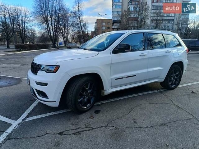 Белый Джип Гранд Чероки, объемом двигателя 5.65 л и пробегом 154 тыс. км за 28900 $, фото 8 на Automoto.ua