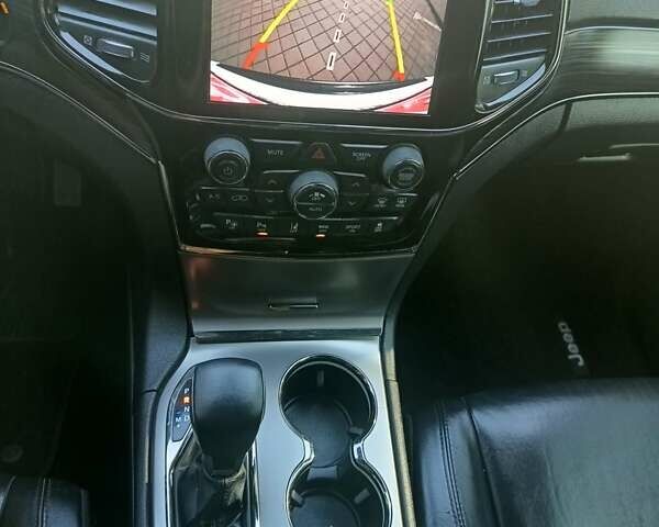 Білий Джип Grand Cherokee, об'ємом двигуна 5.7 л та пробігом 140 тис. км за 29900 $, фото 23 на Automoto.ua