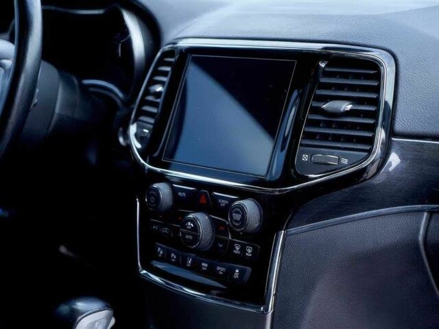 Білий Джип Grand Cherokee, об'ємом двигуна 5.7 л та пробігом 40 тис. км за 16000 $, фото 15 на Automoto.ua