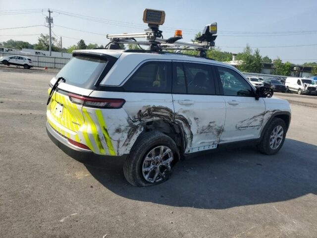 Білий Джип Grand Cherokee, об'ємом двигуна 2 л та пробігом 69 тис. км за 25200 $, фото 2 на Automoto.ua
