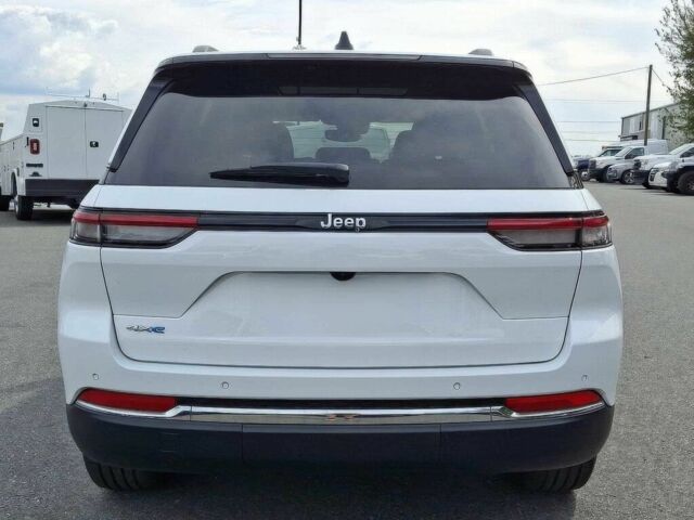 Білий Джип Grand Cherokee, об'ємом двигуна 2 л та пробігом 27 тис. км за 18200 $, фото 4 на Automoto.ua