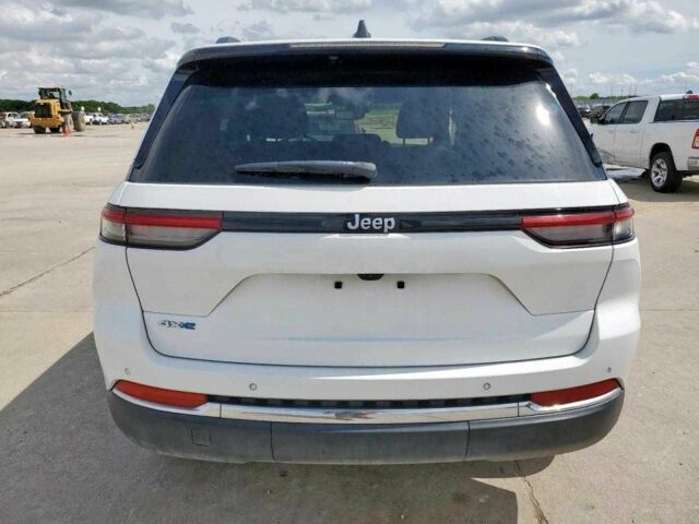 Білий Джип Grand Cherokee, об'ємом двигуна 2 л та пробігом 55 тис. км за 16700 $, фото 2 на Automoto.ua
