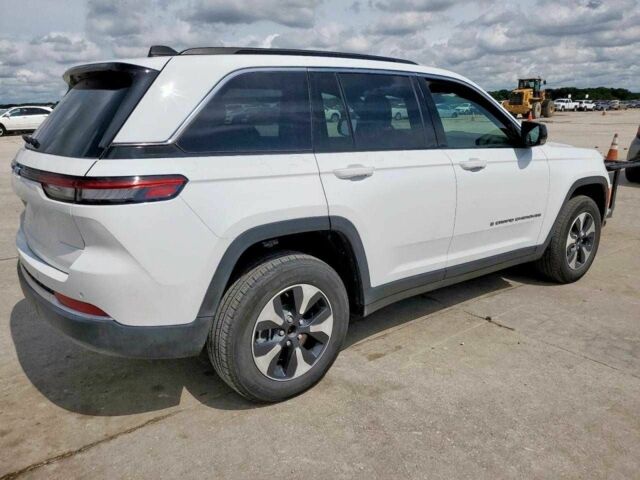 Білий Джип Grand Cherokee, об'ємом двигуна 2 л та пробігом 55 тис. км за 16700 $, фото 3 на Automoto.ua