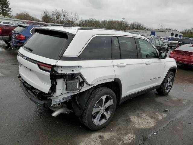 Білий Джип Grand Cherokee, об'ємом двигуна 2 л та пробігом 12 тис. км за 41700 $, фото 2 на Automoto.ua