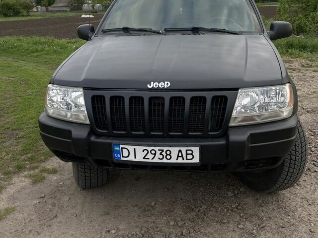 Бежевий Джип Grand Cherokee, об'ємом двигуна 4 л та пробігом 303 тис. км за 5900 $, фото 2 на Automoto.ua