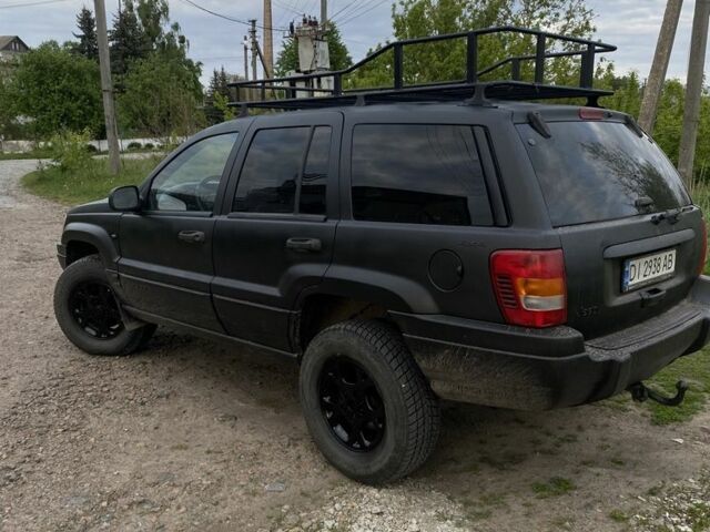 Бежевий Джип Grand Cherokee, об'ємом двигуна 4 л та пробігом 303 тис. км за 5900 $, фото 1 на Automoto.ua