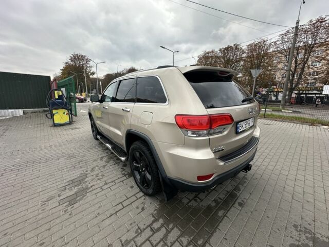 Джип Grand Cherokee 2013 у Рівному на Automoto.ua Бежевий Джип Grand Cherokee, об'ємом двигуна 3 л та пробігом 157 тис. км за 524 $, фото 3 на Automoto.ua