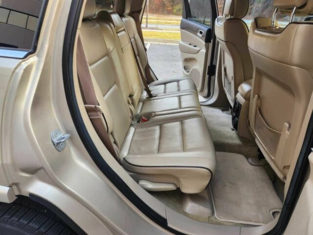 Бежевый Джип Гранд Чероки, объемом двигателя 5.7 л и пробегом 86 тыс. км за 9500 $, фото 11 на Automoto.ua