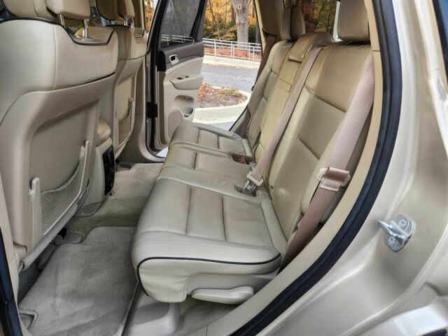 Бежевый Джип Гранд Чероки, объемом двигателя 5.7 л и пробегом 86 тыс. км за 9500 $, фото 12 на Automoto.ua