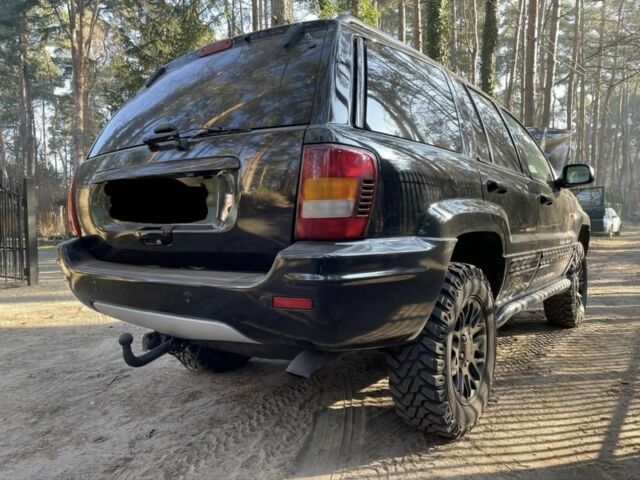 Чорний Джип Grand Cherokee, об'ємом двигуна 2.4 л та пробігом 270 тис. км за 10500 $, фото 1 на Automoto.ua