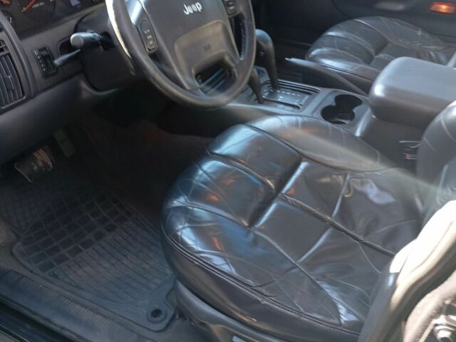 Черный Джип Гранд Чероки, объемом двигателя 3.1 л и пробегом 331 тыс. км за 6900 $, фото 4 на Automoto.ua