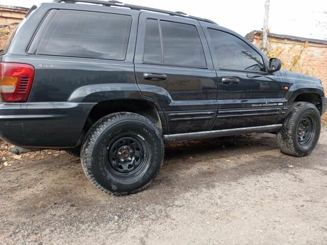 Черный Джип Гранд Чероки, объемом двигателя 3.1 л и пробегом 331 тыс. км за 6900 $, фото 1 на Automoto.ua