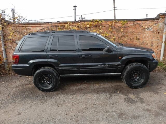 Черный Джип Гранд Чероки, объемом двигателя 3.1 л и пробегом 331 тыс. км за 6900 $, фото 2 на Automoto.ua
