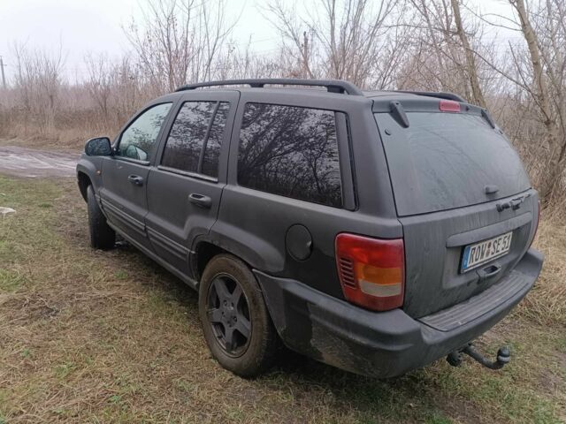 Черный Джип Гранд Чероки, объемом двигателя 2.7 л и пробегом 380 тыс. км за 4700 $, фото 7 на Automoto.ua