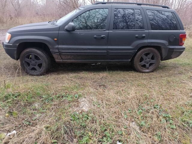 Черный Джип Гранд Чероки, объемом двигателя 2.7 л и пробегом 380 тыс. км за 4700 $, фото 2 на Automoto.ua