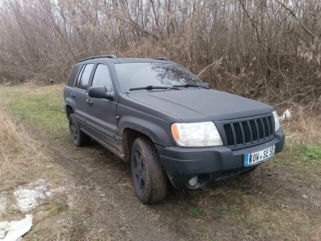 Черный Джип Гранд Чероки, объемом двигателя 2.7 л и пробегом 380 тыс. км за 4700 $, фото 1 на Automoto.ua