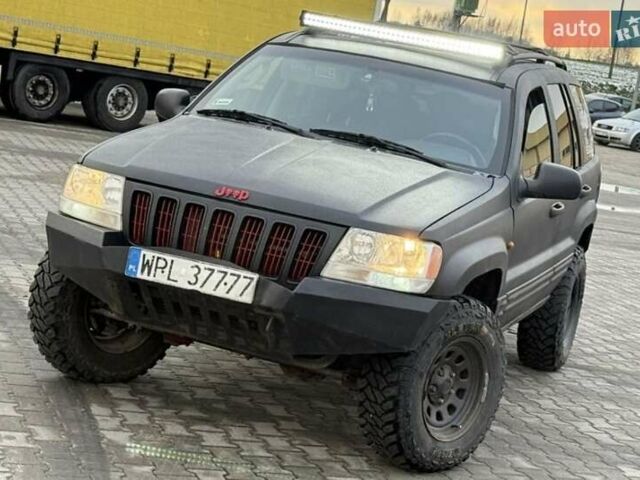 Чорний Джип Grand Cherokee, об'ємом двигуна 3 л та пробігом 239 тис. км за 3750 $, фото 2 на Automoto.ua