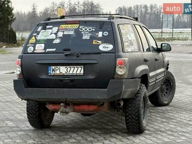 Чорний Джип Grand Cherokee, об'ємом двигуна 3 л та пробігом 239 тис. км за 3750 $, фото 3 на Automoto.ua