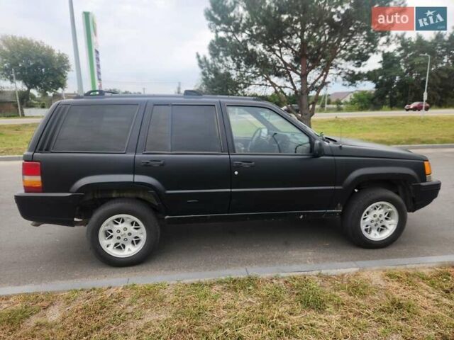 Чорний Джип Grand Cherokee, об'ємом двигуна 5.2 л та пробігом 350 тис. км за 5000 $, фото 1 на Automoto.ua