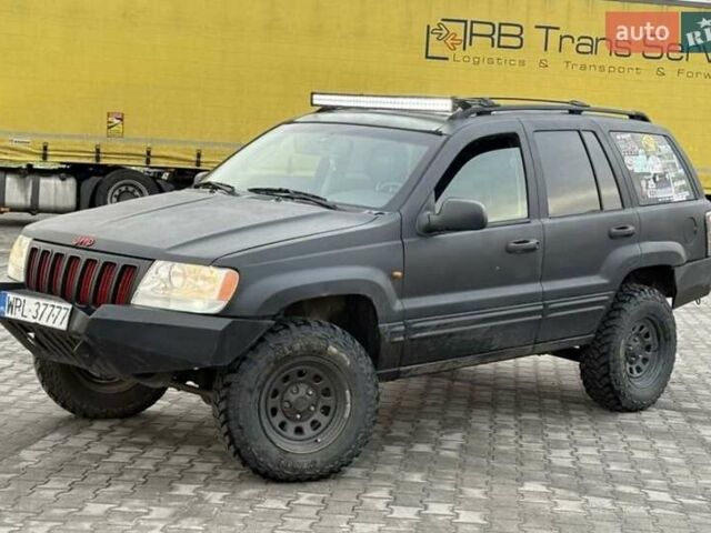 Чорний Джип Grand Cherokee, об'ємом двигуна 3 л та пробігом 239 тис. км за 3750 $, фото 4 на Automoto.ua