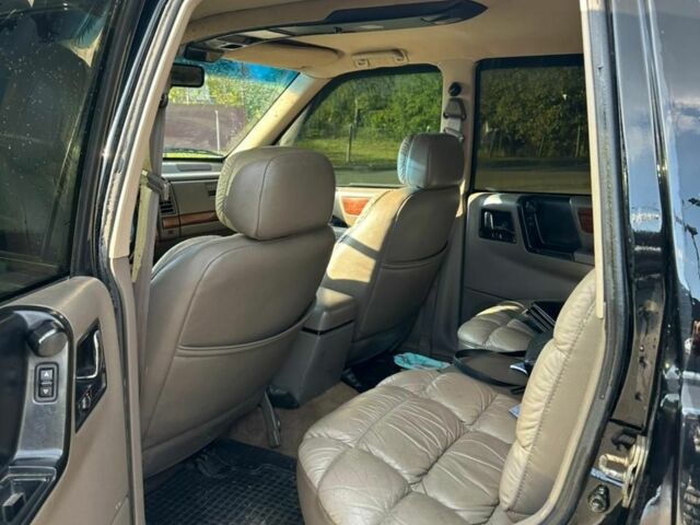 Черный Джип Гранд Чероки, объемом двигателя 5.2 л и пробегом 345 тыс. км за 5900 $, фото 5 на Automoto.ua