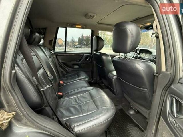 Чорний Джип Grand Cherokee, об'ємом двигуна 3 л та пробігом 239 тис. км за 3750 $, фото 8 на Automoto.ua