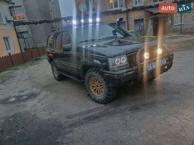 Черный Джип Гранд Чероки, объемом двигателя 5.2 л и пробегом 350 тыс. км за 5400 $, фото 4 на Automoto.ua